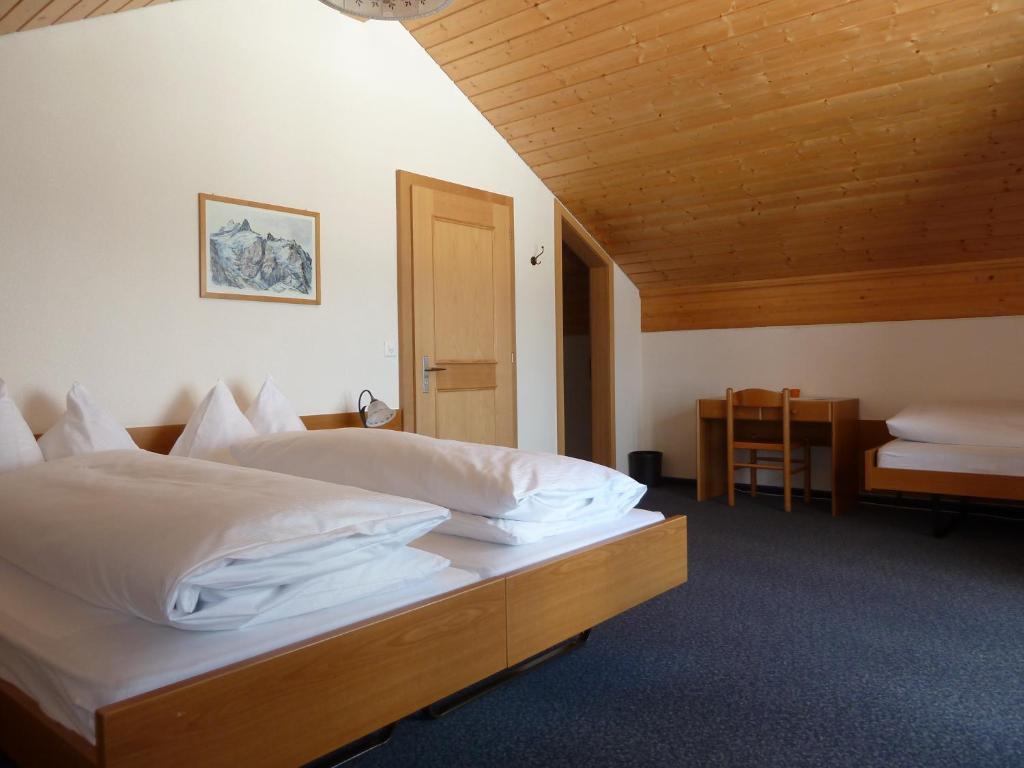 Berghaus Maennlichen Hotel Гринделвалд Стая снимка